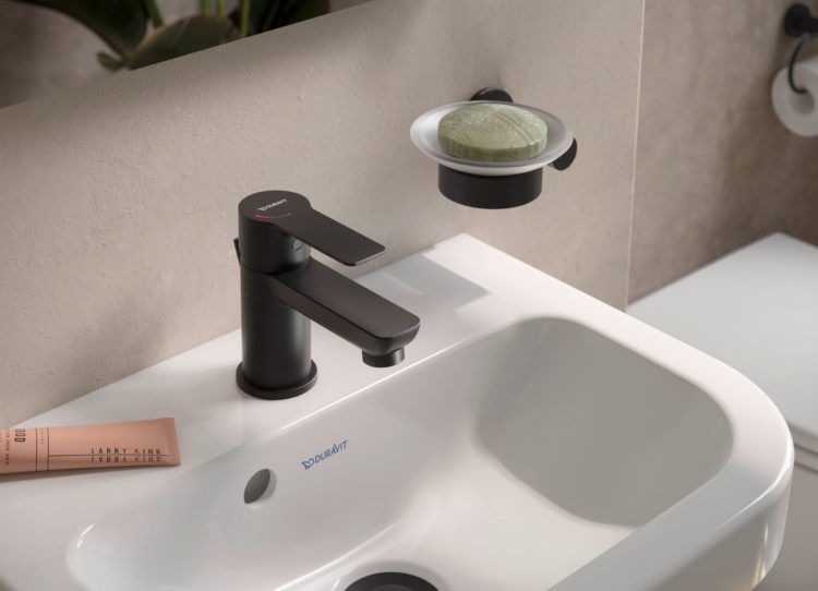 Kleines Handwaschbecken mit großzügigem Innenbecken und Ablagefläche - ideal für ein kleines Bad